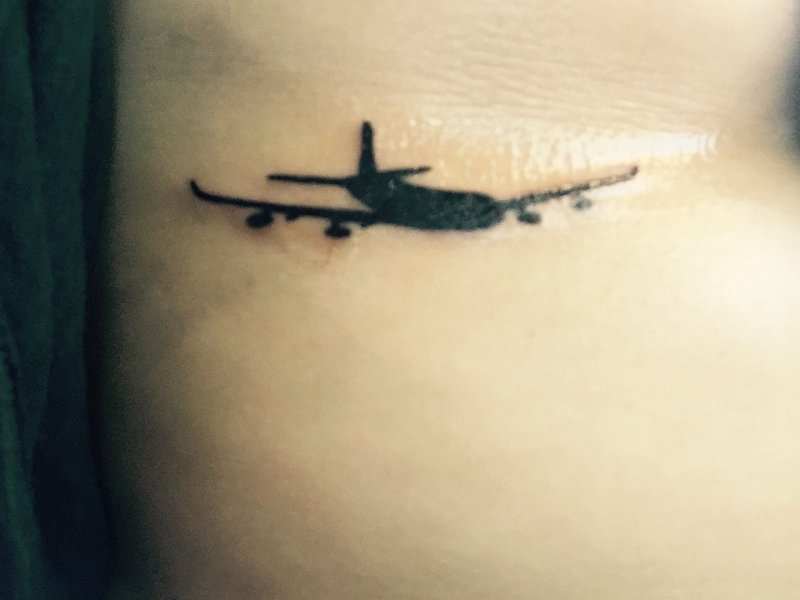 Freedom и самолёт тату
