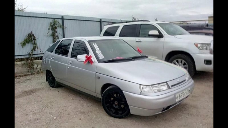 ВАЗ 2112 серебристая опер