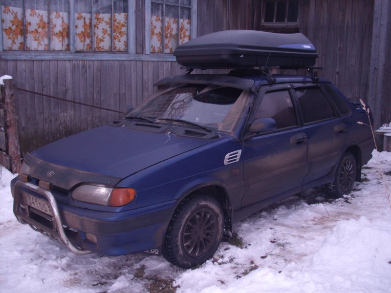 Тюнингованная ВАЗ 2114 черная