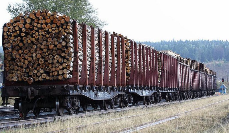 Вагон с бревнами