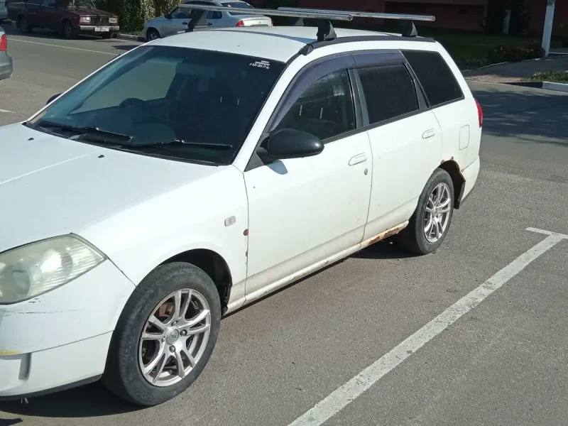 Nissan Wingroad 11