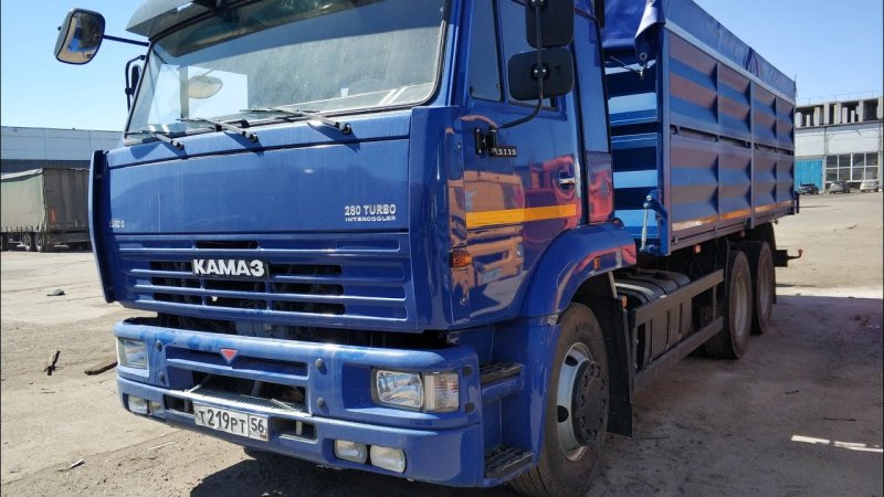 КАМАЗ 65115 зерновоз с прицепом бортовой