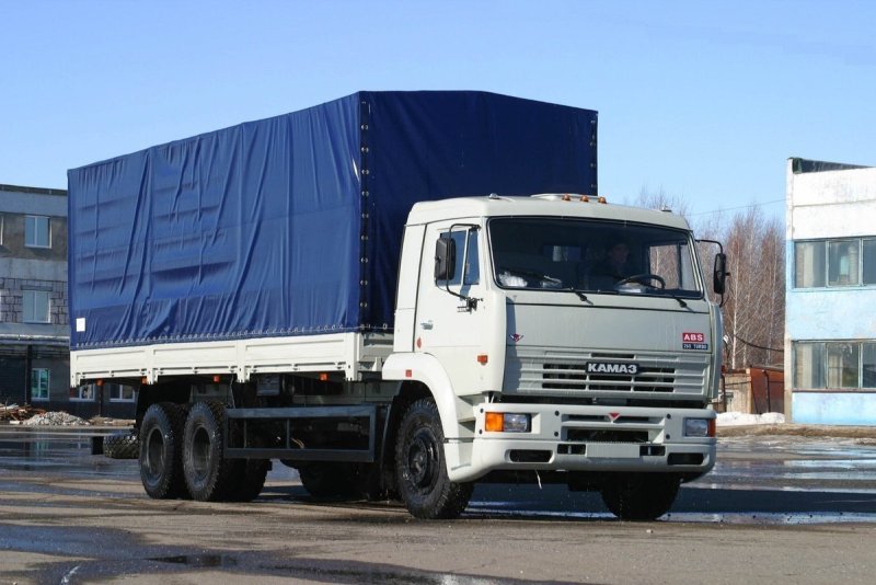 КАМАЗ 65117 бортовой с прицепом
