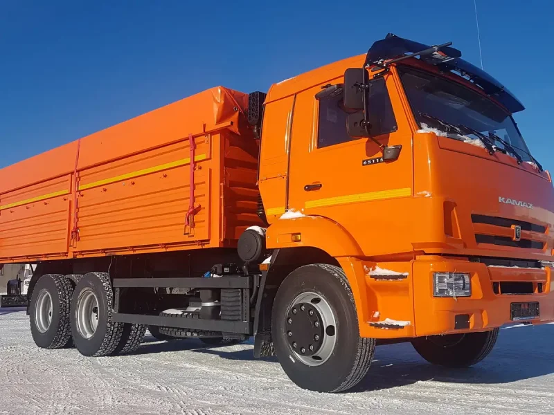 КАМАЗ оранжевый 65115 самосвал