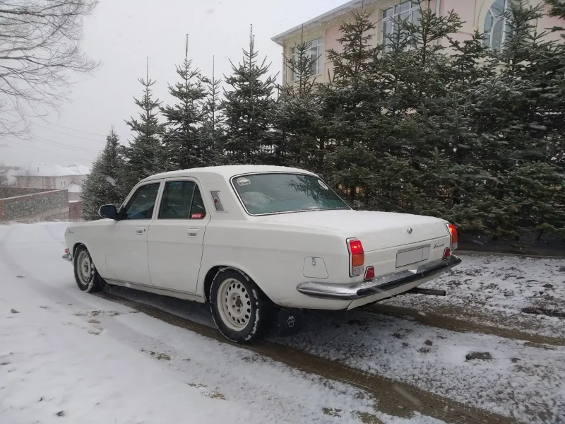 Волга ГАЗ 3102 черная