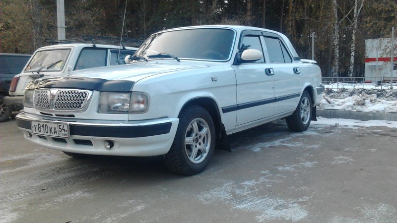 ГАЗ 3110 серебристая
