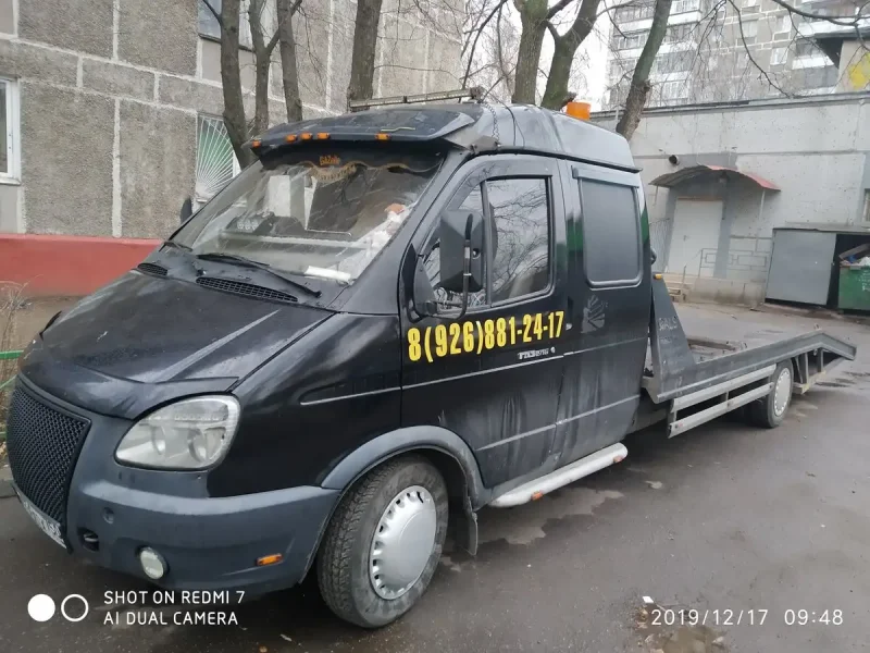 Черная Газель бизнес эвакуатор
