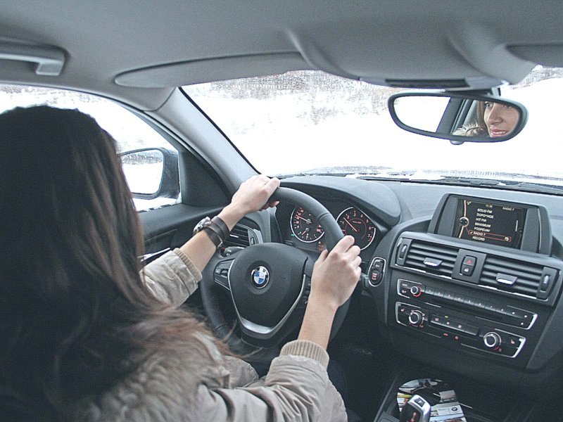 За рулем BMW 118