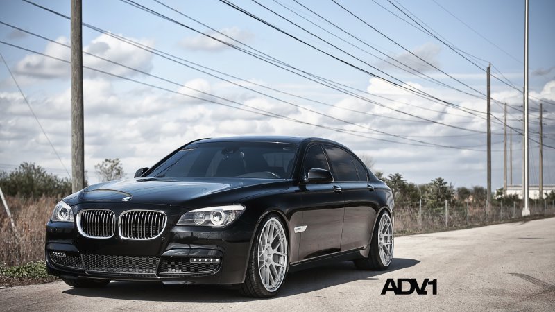 Черная БМВ 7 Альпина
