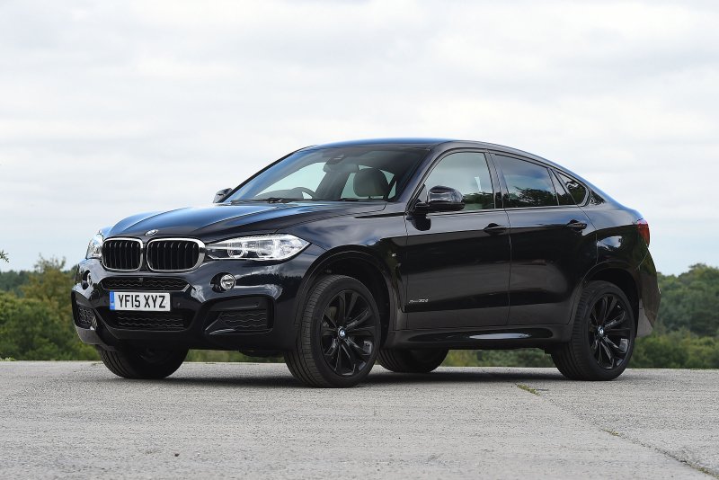 BMW x6 m50d черный