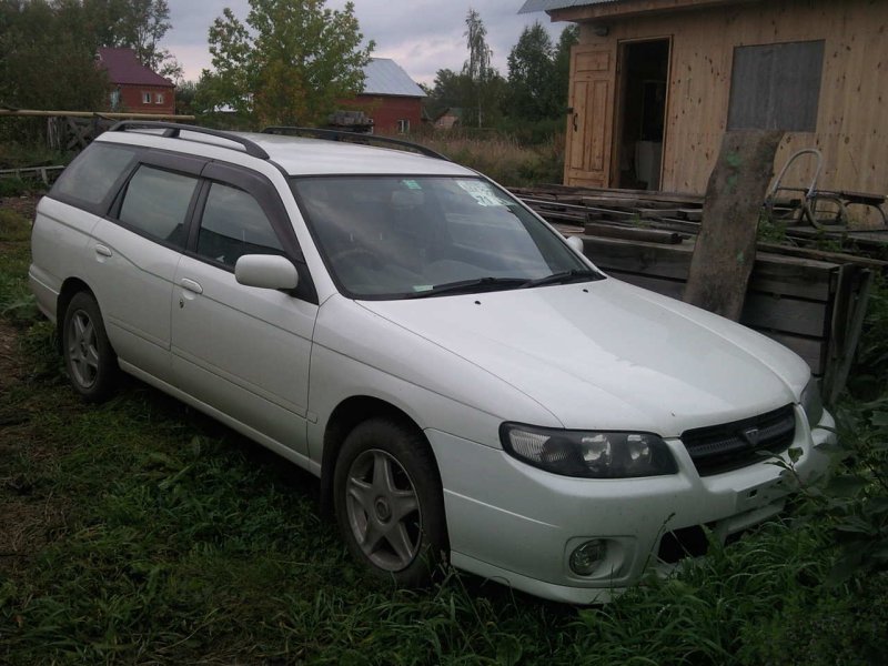 Спойлер Ниссан Авенир