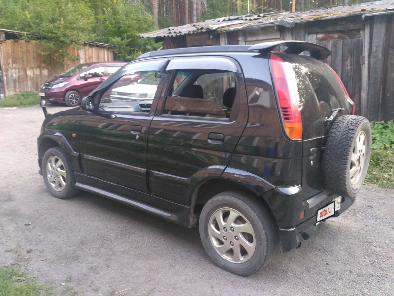 Toyota Cami бампер передний