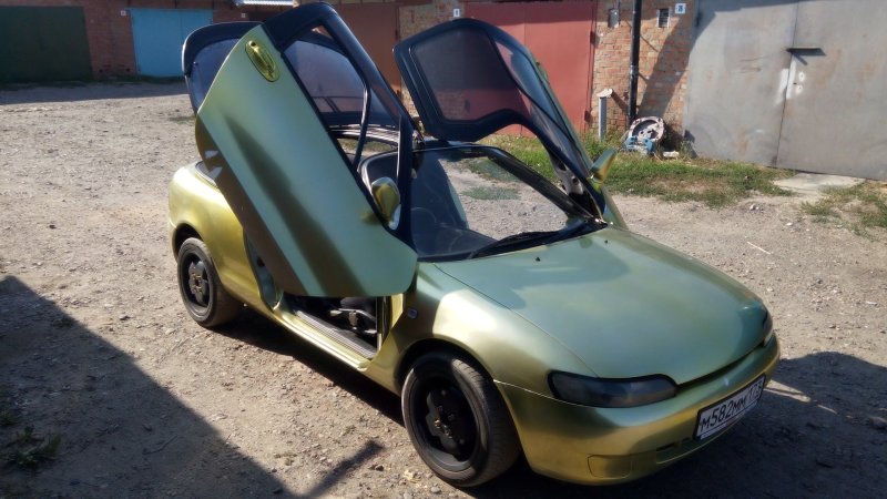 Тойота сера 100
