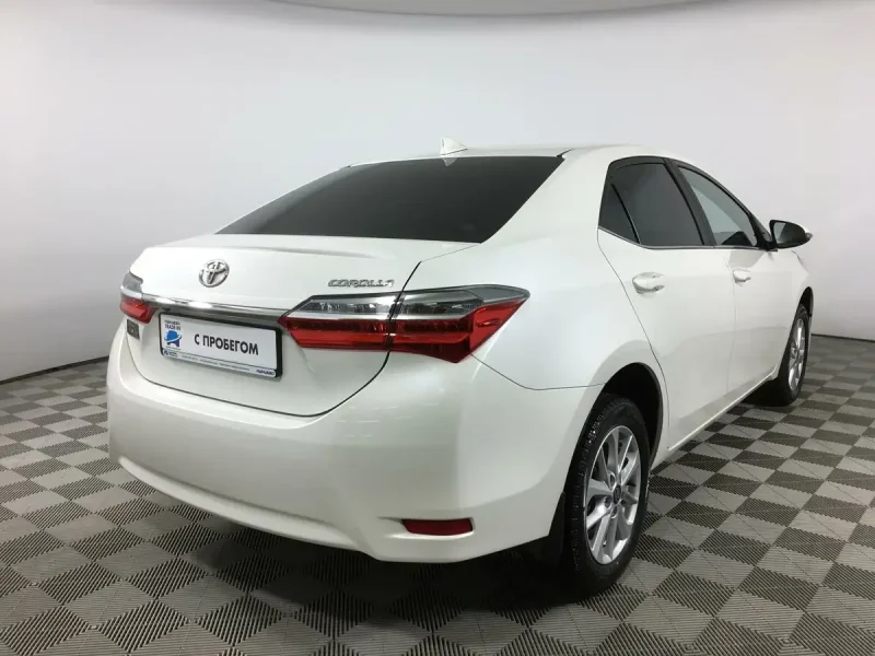 Тойота Королла e150 белый