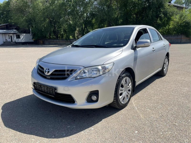 Тойота Королла е150 серебристая