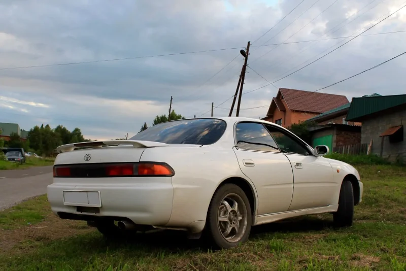 Тойота Карина ед st200