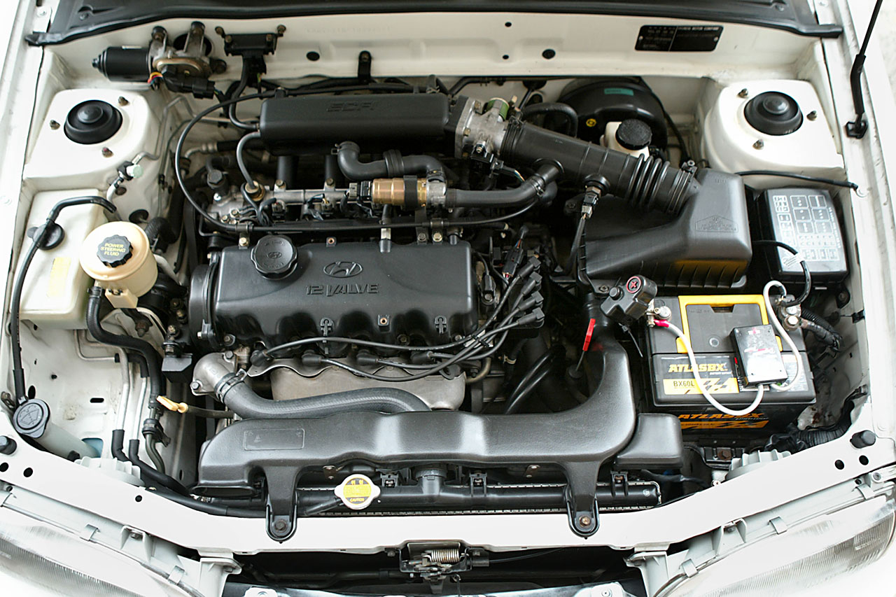 Какой двигатель на акценте. Двигатель Hyundai Accent. Двигатель Хендай акцент ТАГАЗ 1.5. Hyundai Accent 1996 мотор. Двигатель Хендай акцент 1.3.