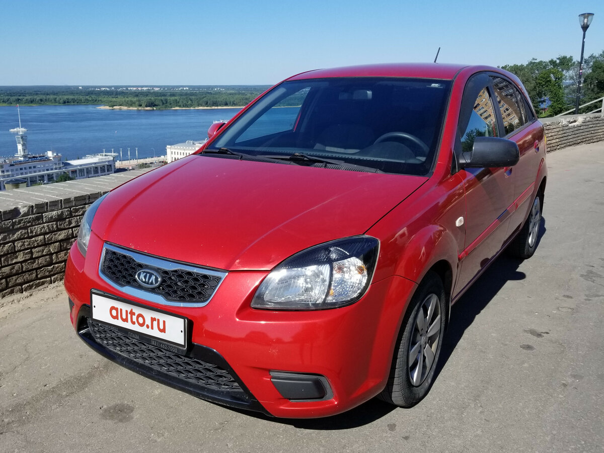 Фото 2010 года. Kia Rio 2010 хэтчбек. Kia Rio 2 2010 красный. Kia Rio 2 2010. Киа Рио 2010 красный.