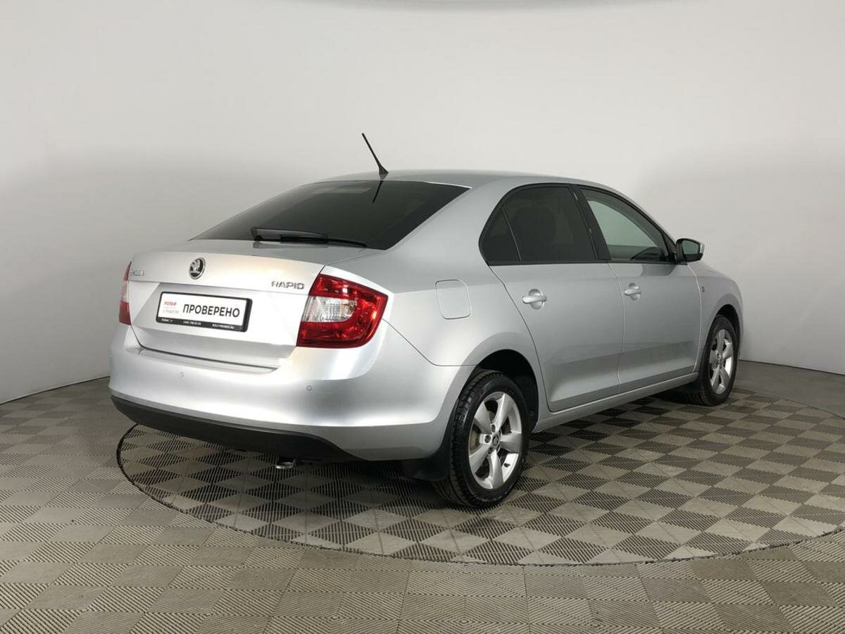 Шкода рапид 2014. Skoda Rapid 1.2 2014. Skoda Rapid 2014 лифтбек. Серебристая Skoda Rapid 2014.