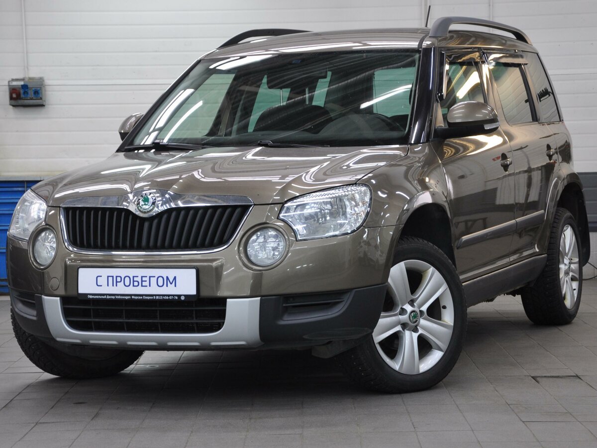 Шкода йети 2012 1.2. Skoda Yeti 2012. Шкода Йети 2012 салон. Skoda Yeti 2012 багажник. Skoda Yeti i 1.2 АМТ (105 Л.С.) серебристый с пробегом.