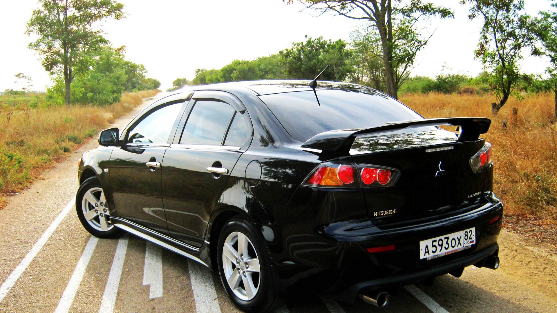 Mitsubishi lancer черный. Mitsubishi Lancer 10 черный. Мицубиси Лансер 10 черный. Лансер 10 Митсубиси черный черный. Митсубиши Лансер 10 черный.