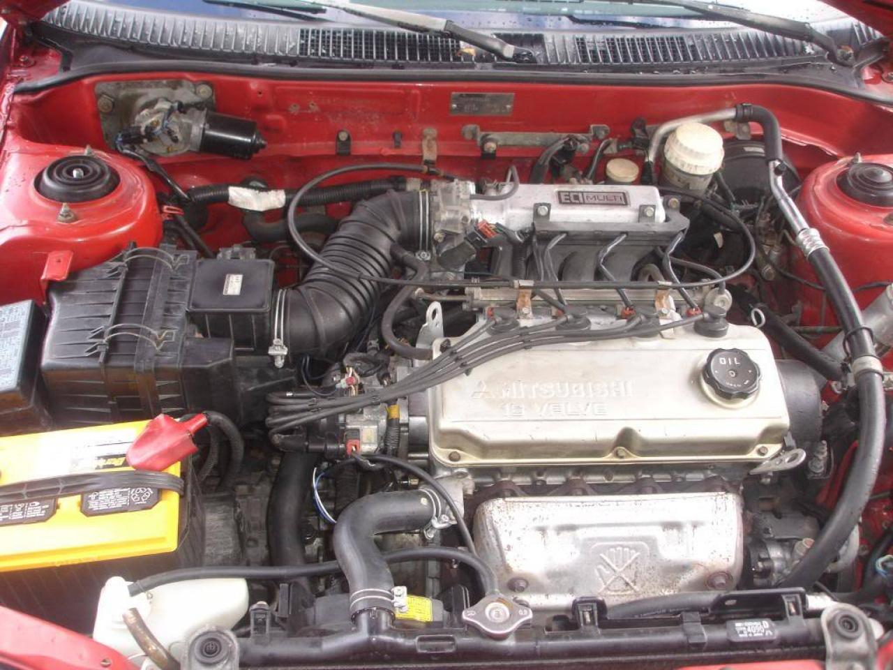 Мицубиси кольт двигатели. Mitsubishi Lancer 1993 4g92. Мицубиси Кольт 1992 1.6. Mitsubishi Colt 1993. Митсубиси Кольт 1993.