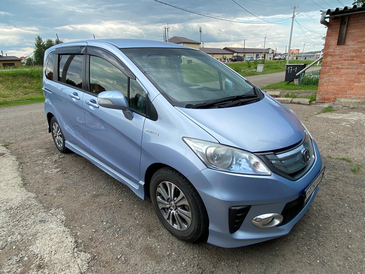 Хонда фрид 2012 года гибрид. Honda freed 2012. Хонда Фрид i 2012. Хонда Фрид 2012 фиолетовый. Хонда Фрид 2012 панель.