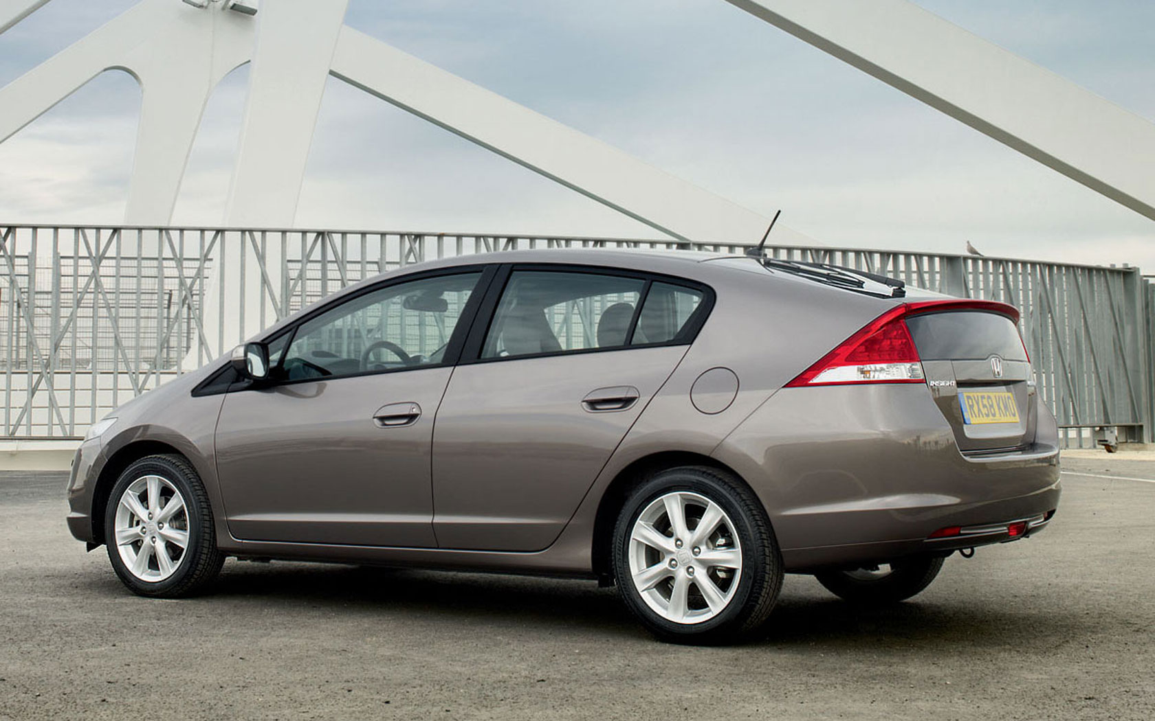 Хонда инсайт 2009. Honda Insight 2009-2014. Honda Insight 2014. Хонда Инсайт хэтчбек. Honda инсайд 2009.