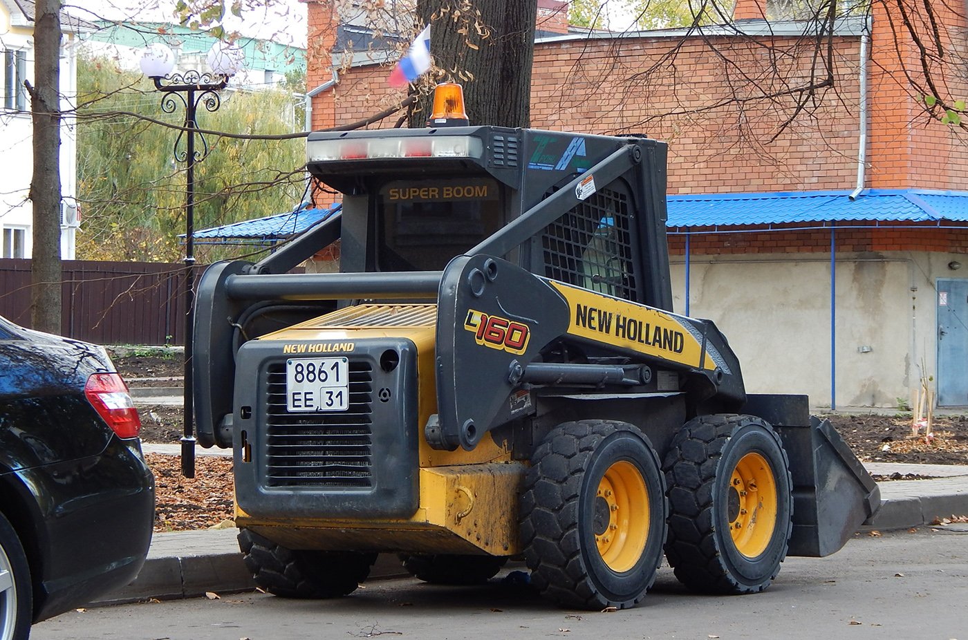 Самоходный погрузчик. New Holland l160. Нью Холланд l160. New Holland 318 мини погрузчик. Мини погрузчик Ньюхолонд l160.