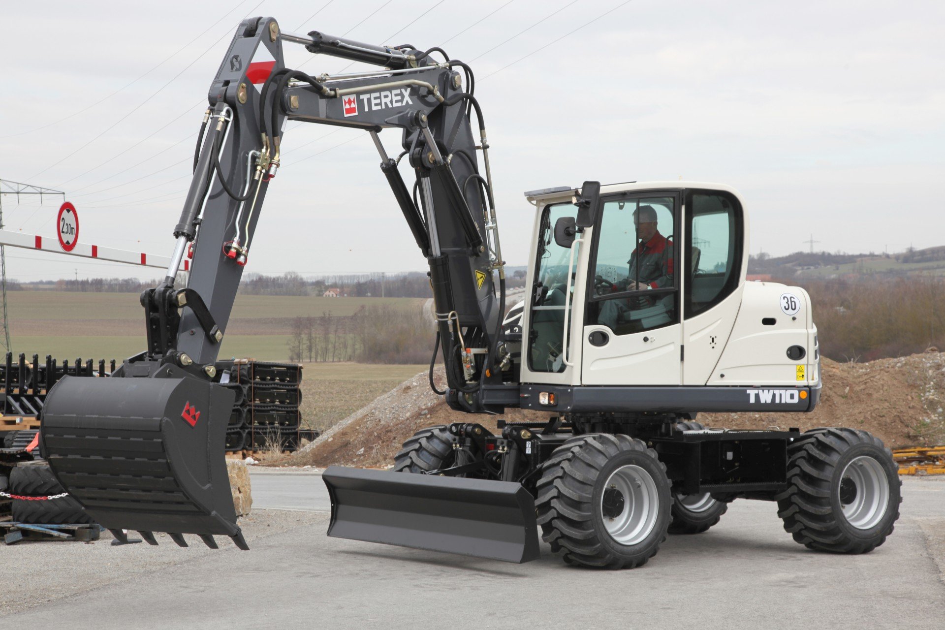 Экскаватор терекс. Экскаватор Terex tw110. Колесный экскаватор Terex Atlas TW 110. Terex tw110 (HML 42). Экскаватор Terex 110.