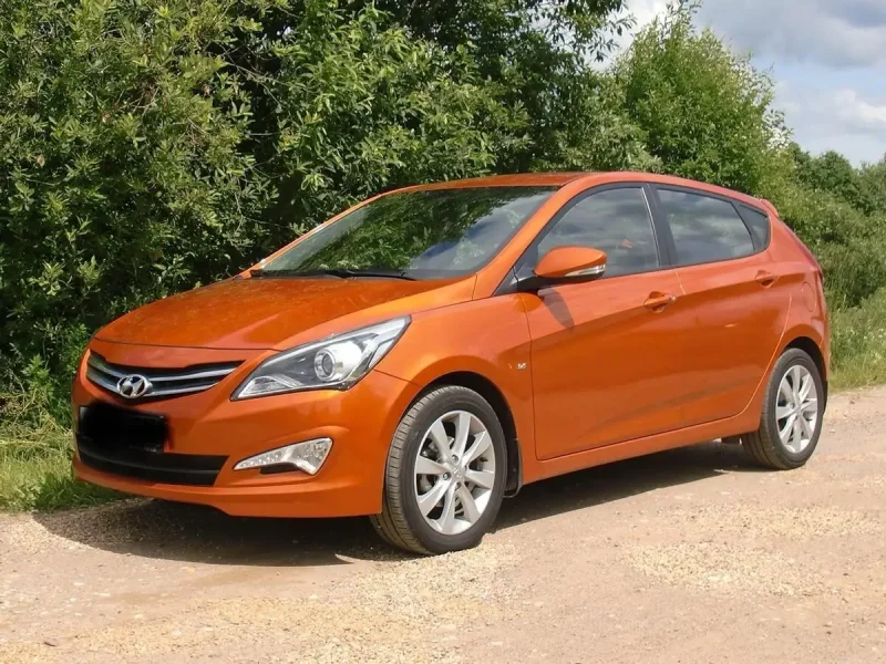 Hyundai Solaris 2014 оранжевый хэтчбек
