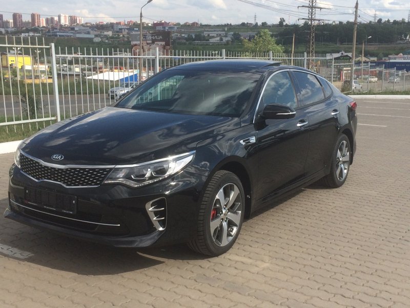 Kia Rio 3 сбоку черная