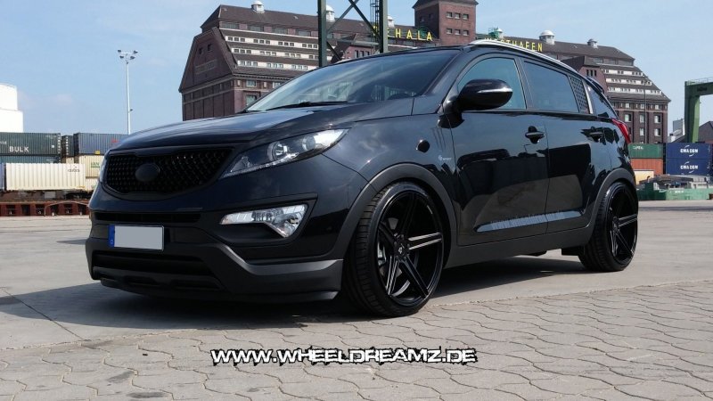 Kia Sportage 3 черный тюнинг