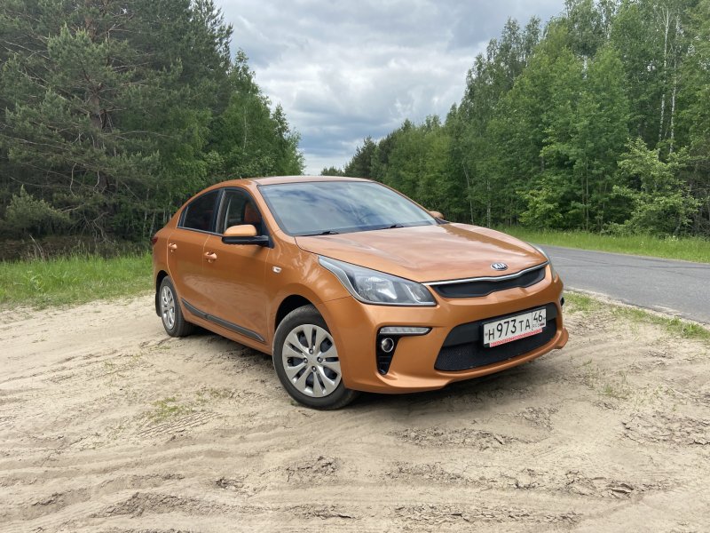 Kia Rio оранжевый тонированный