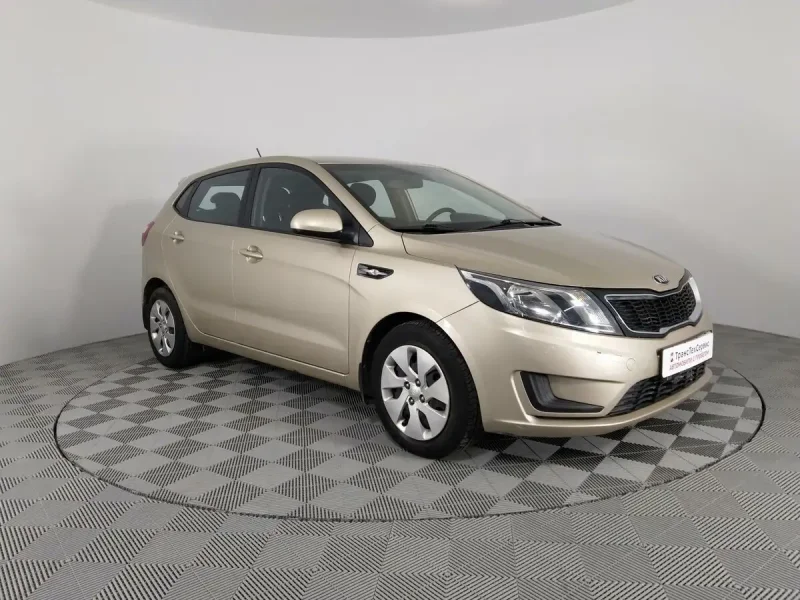 Kia Rio 3 бежевая
