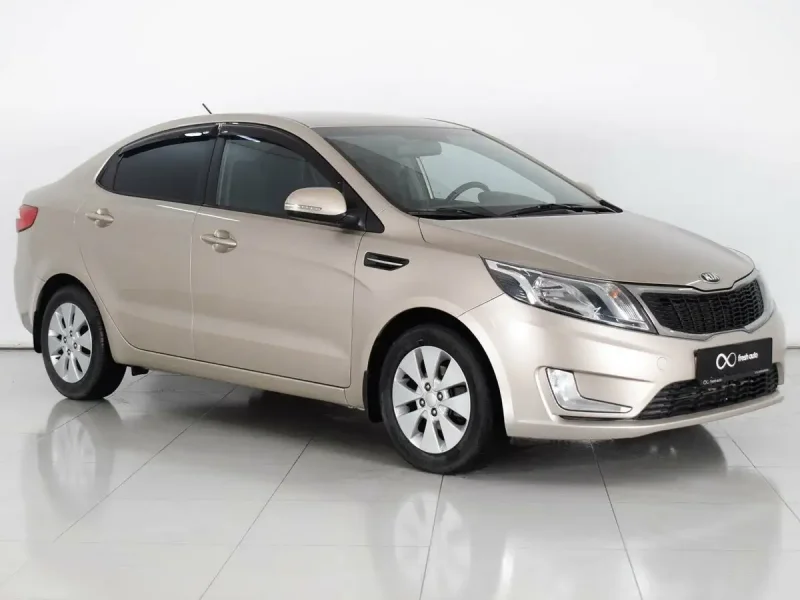 Kia Rio седан бежевый 2012