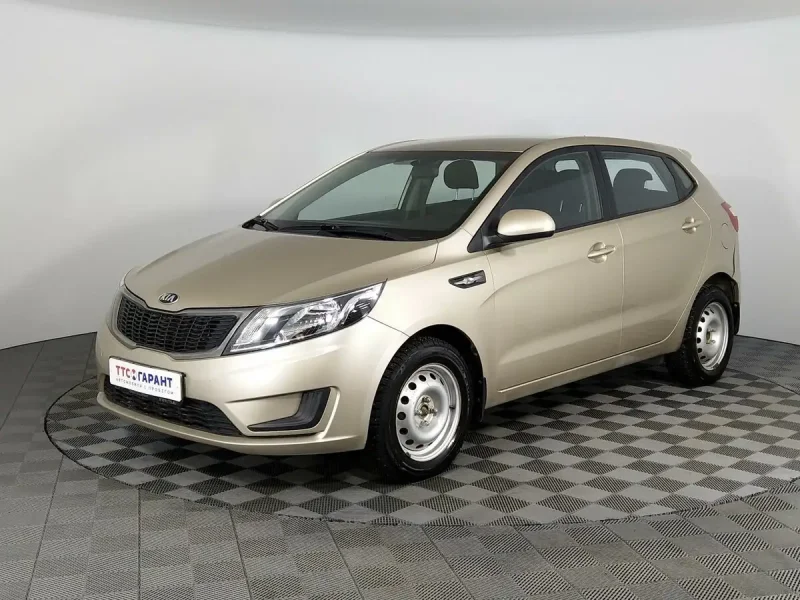Kia Rio 3 бежевая