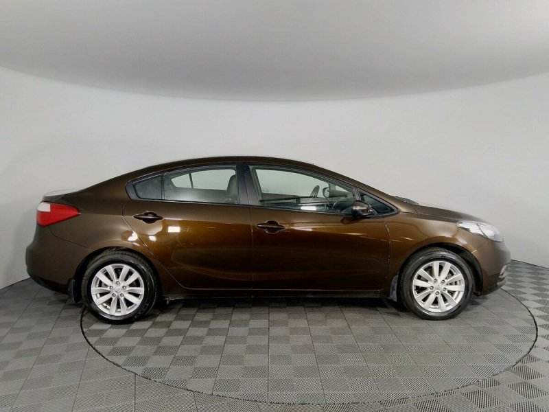 Kia Cerato коричневый