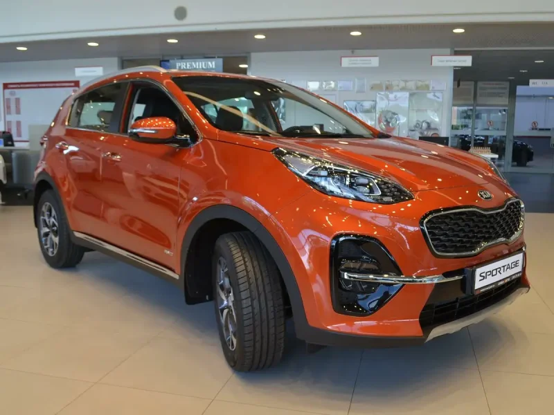 Orange Kia Sportage 3