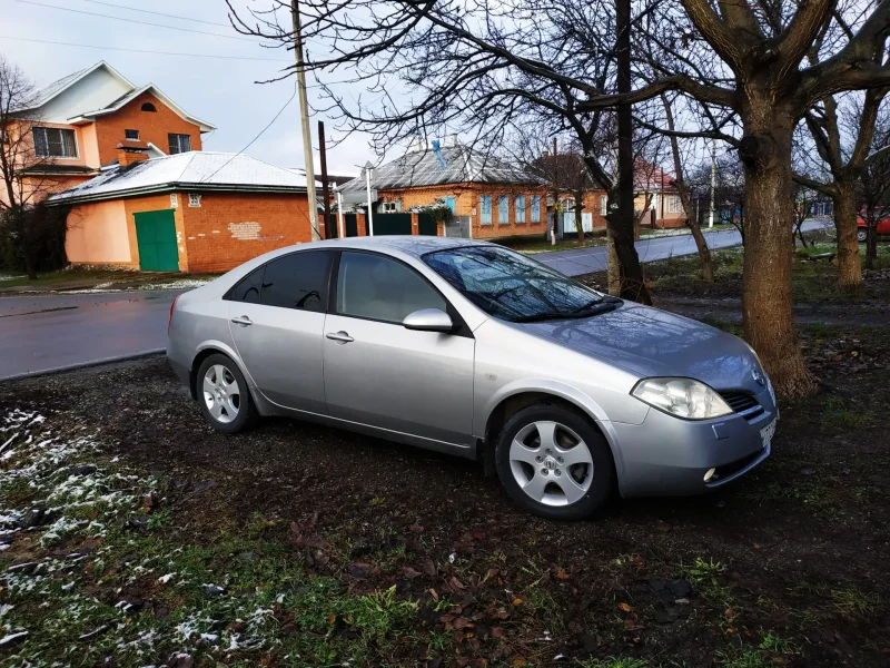 Nissan primera 2004 золотистая