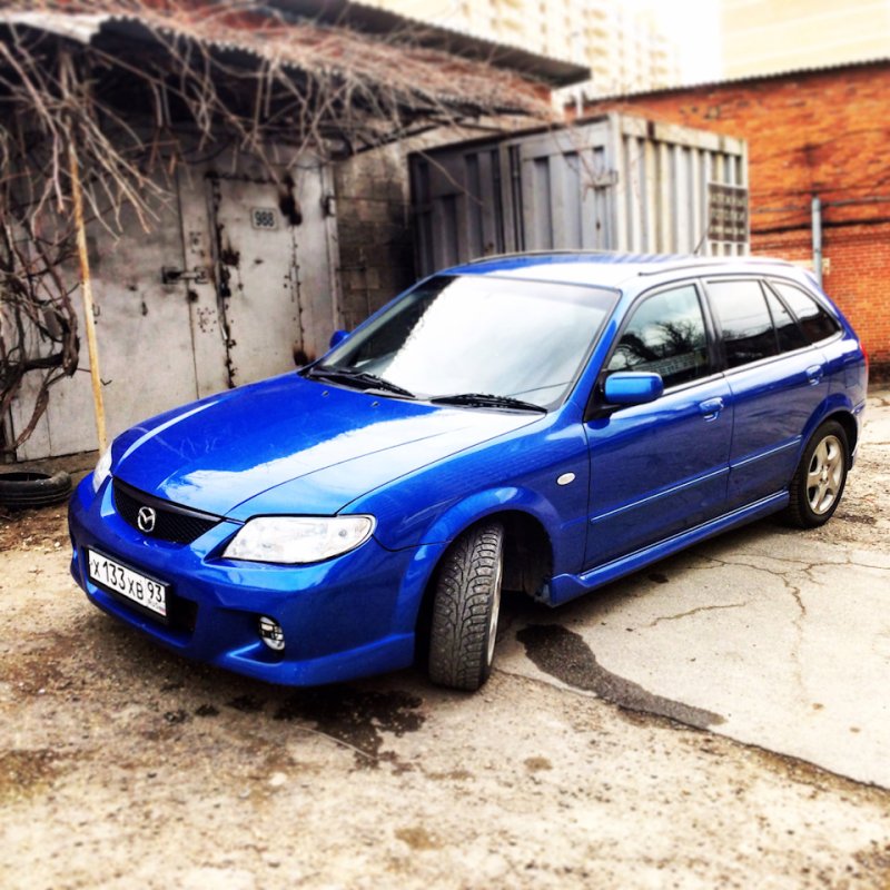 Mazda familia 2003 хэтчбек Restyling