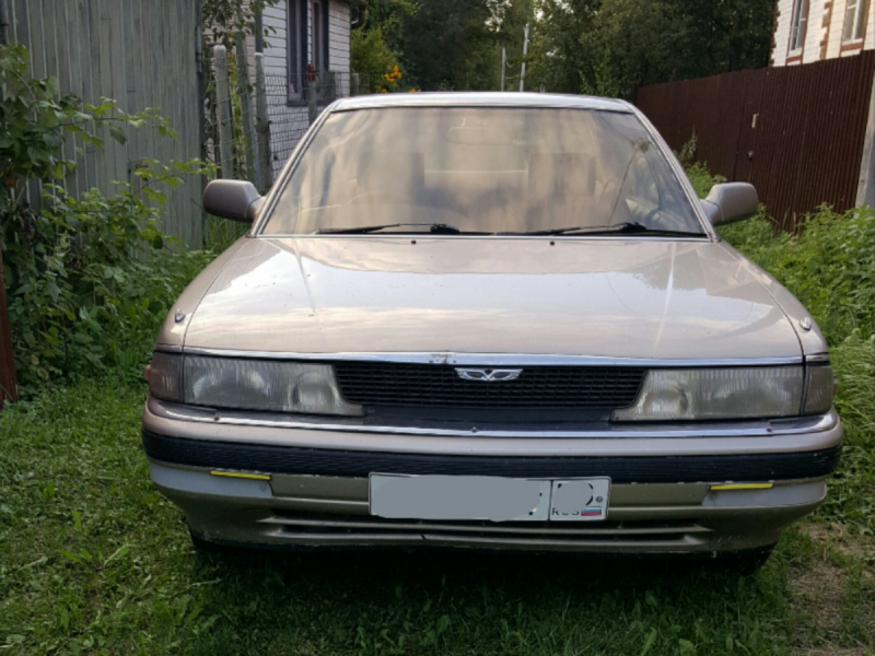 Mazda persona 1992 год