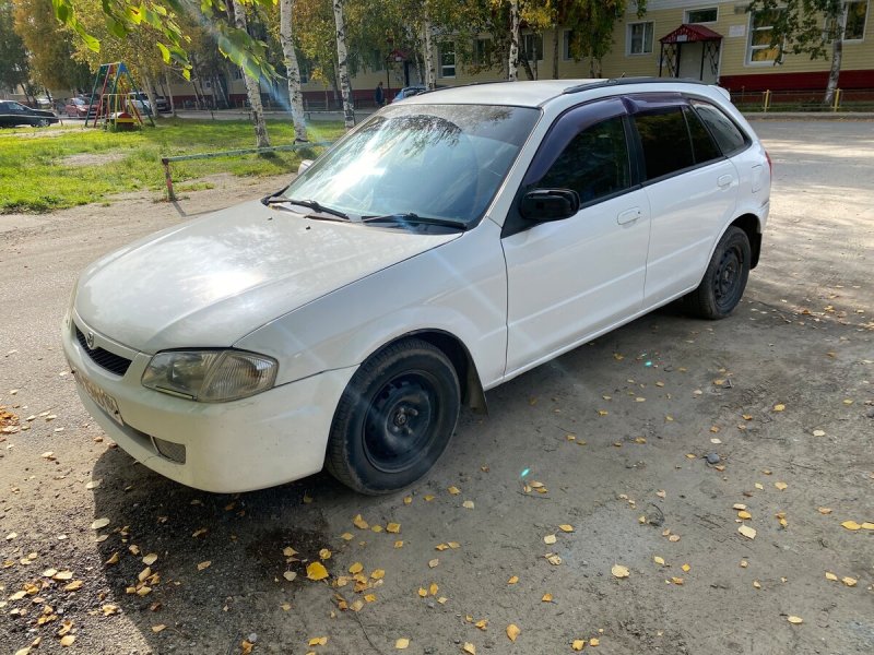 Мазда фамилия 4wd седан 1999