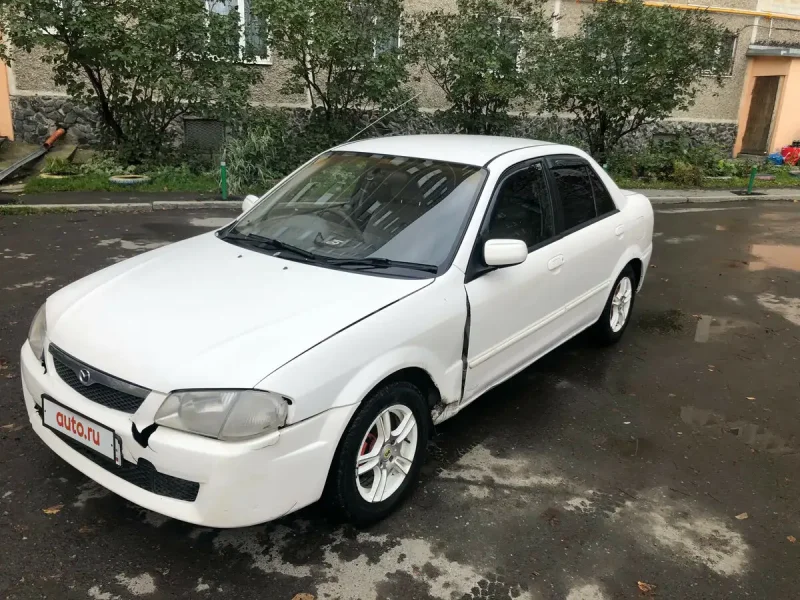 Mazda familia 1.5 at, 1999,