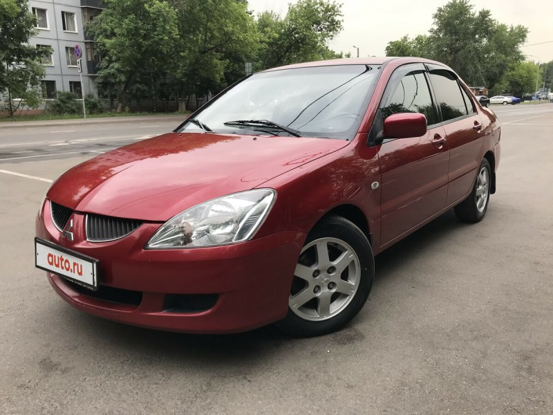 Лансер 9 красный 2004