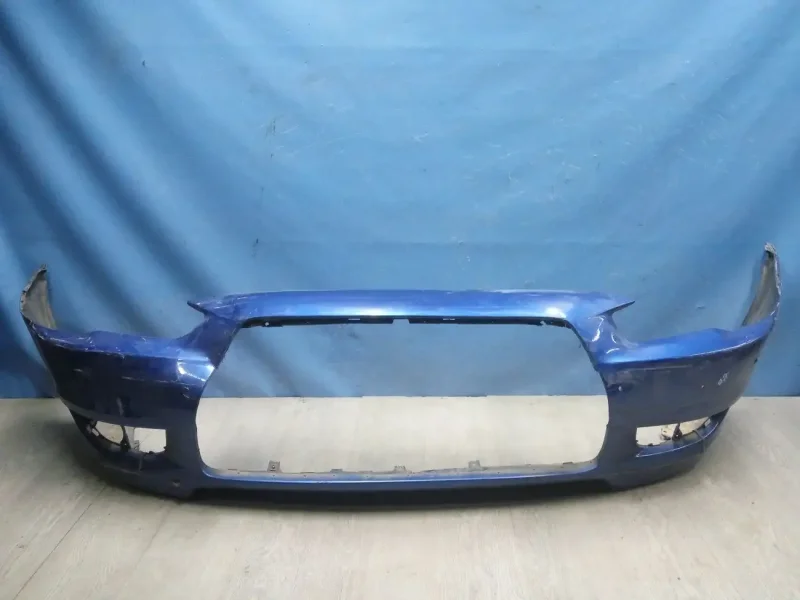 Бампер на Mitsubishi Lancer 10 передний 2007г