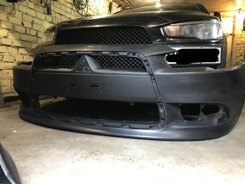 Бампер передний Mitsubishi Lancer 10