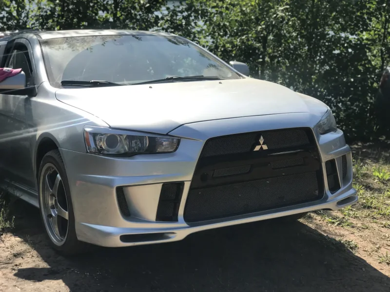 Бампер Mitsubishi Lancer 10 Рестайлинг