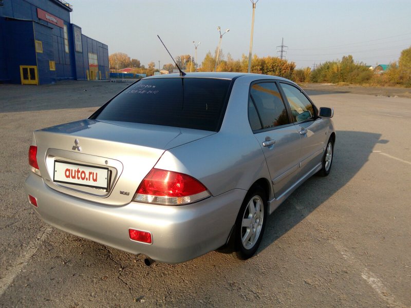 Мицубиси Лансер 2005 золотистый