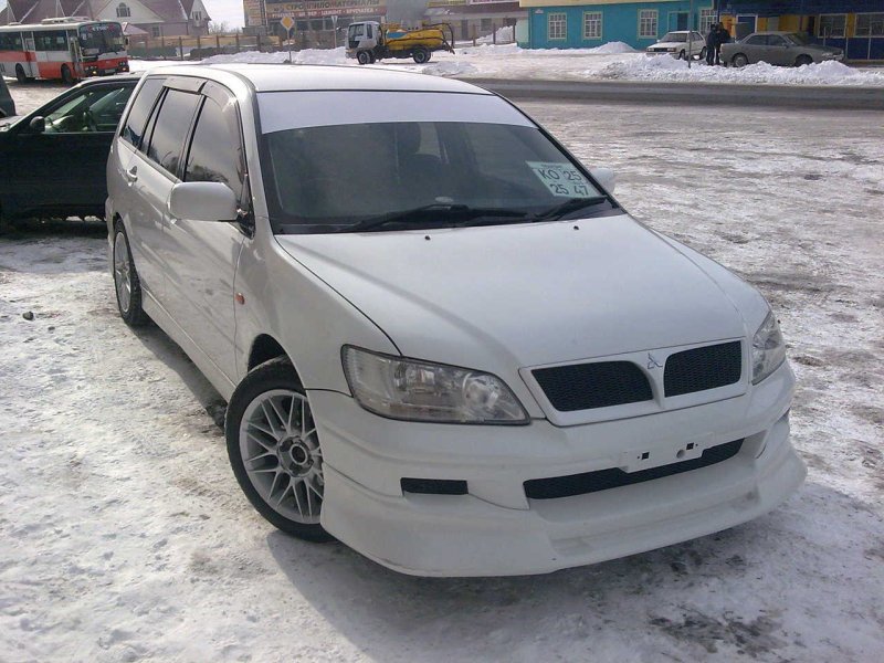 Мицубиси Лансер цедия
